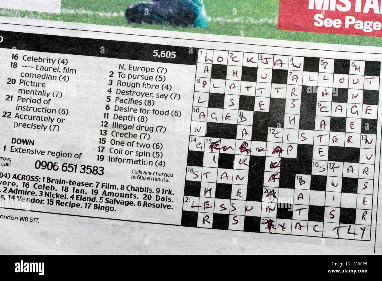Daily Mail Newspaper 24th December 2010 Crossword Puzzle Completed Stock Photo Alamy